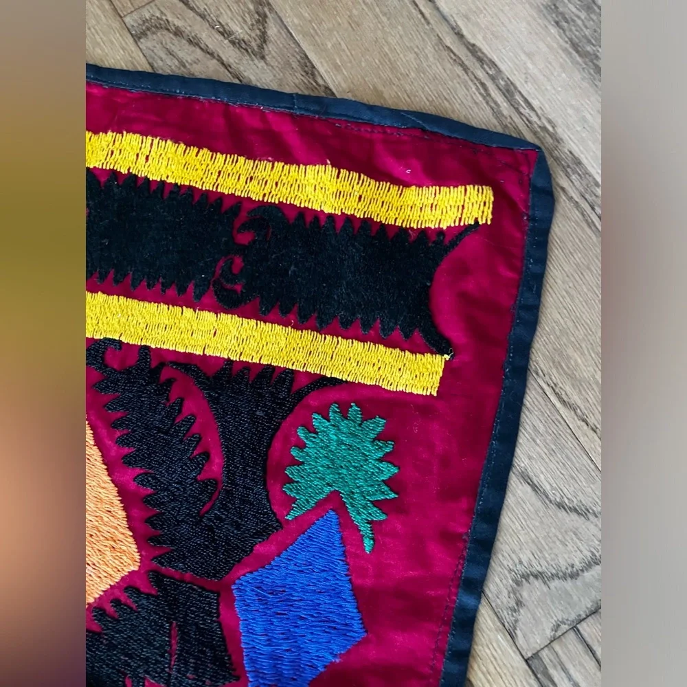 Suzane embroidered with cotton threads on cotton red fabric, hand made